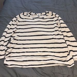 Woman’s stripped knit sweater